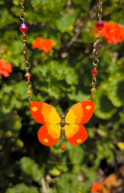 Collier papillon au motif coucher de soleil
